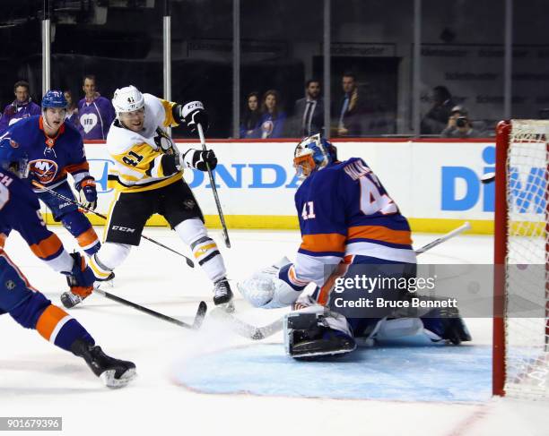 Daniel Sprong of the Pittsburgh Penguins scores his second goal of the game at 13:28 of the third period against Jaroslav Halak of the New York...