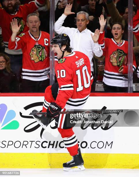 Fans, including Chicago mayor Rahm Emanuel , cheer as Patrick Sharp of the Chicago Blackhawks celebrates a second period goal against the Vegas...