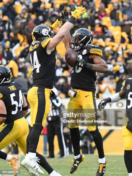 Safety Sean Davis and linebacker Tyler Matakevich of the Pittsburgh Steelers celebrate an interception by Davis in the fourth quarter of a game on...