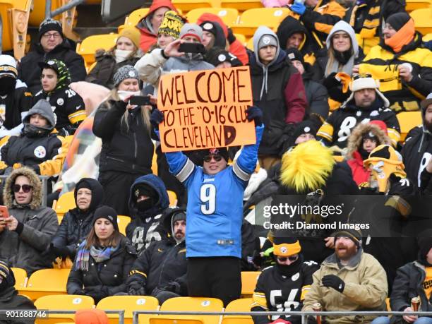 Fan of the Detroit Lions holds up a sign in the fourth quarter of a game on December 31, 2017 between the Cleveland Browns and Pittsburgh Steelers at...