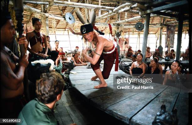 Nick Nolte as Learoyd stares at Nigel Havers as Captain Fairbourne during the filming of Farewell to The King August 1987 in Sarawak, Borneo,...