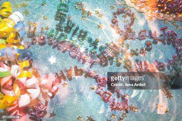 birthday party table with confetti and birthday party favors - quinceanera party stock pictures, royalty-free photos & images