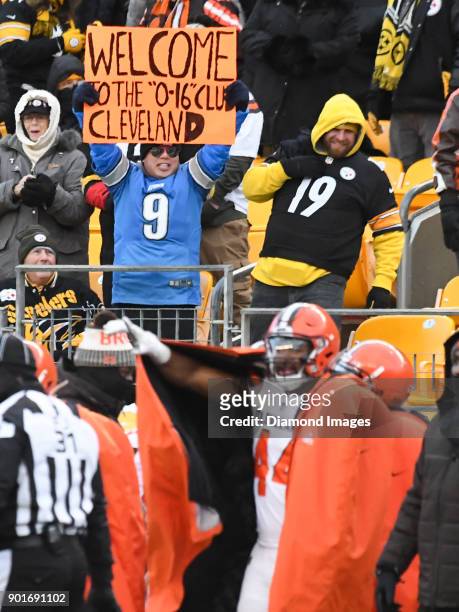 Fan of the Detroit Lions holds up a sign in the fourth quarter of a game on December 31, 2017 between the Cleveland Browns and Pittsburgh Steelers at...