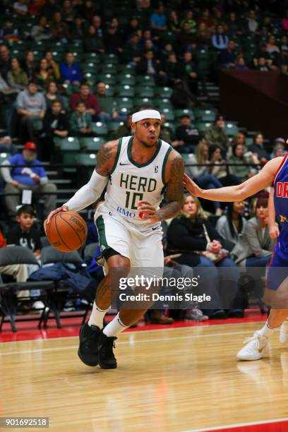 Shannon Brown of the Wisconsin Herd takes dribbles the ball against the Grand Rapids Drive at The DeltaPlex Arena for the NBA G-League on JANUARY 5,...