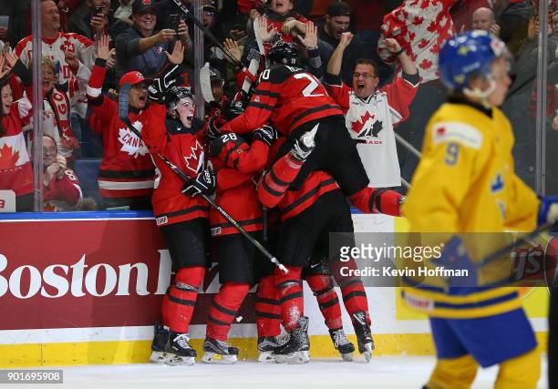 Tyler Steenbergen of Canada celebrates after scoring the winning goal against Sweden during the Gold medal game of the IIHF World Junior Championship...