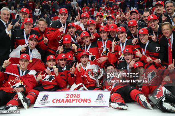 Team Canada poses after beating Sweden in the Gold medal game of the IIHF World Junior Championship at KeyBank Center on January 5, 2018 in Buffalo,...
