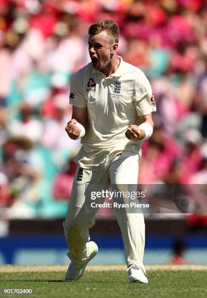 Mason Crane of England celebrates after taking the wicket of Usman Khawaja of Australia during day three of the Fifth Test match in the 2017/18 Ashes...