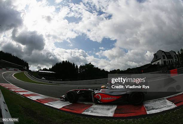 Lewis Hamilton of Great Britain and McLaren Mercedes drives thru Eau Rouge during the final practice session prior to qualifying for the Belgian...