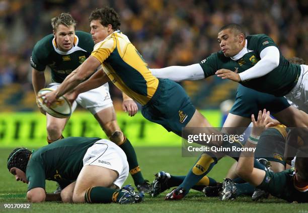 Luke Burgess of the Wallabies passes the ball during the 2009 Tri Nations series match between the Australian Wallabies and the South African...