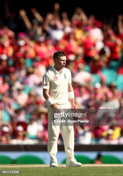 Mason Crane of England reacts while bowling during day three of the Fifth Test match in the 2017/18 Ashes Series between Australia and England at...