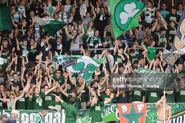 Supporters of Fuerth cheer their team during the Second Bundesliga match between SpVgg Greuther Fuerth and Arminia Bielefeld at Playmobil Stadium on...