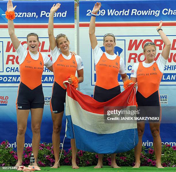 Chantal Achtenberger, Nienke Kingma, Carline Bouw, Femke Dekker of the Netherlands react after they won gold medal in the final of the women's four...