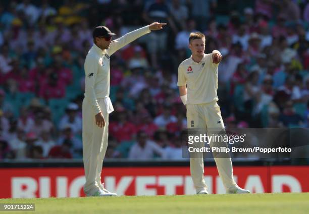 Mason Crane and Jor Root of England point during the third day of the fifth Ashes cricket test match between Australia and England at the Sydney...