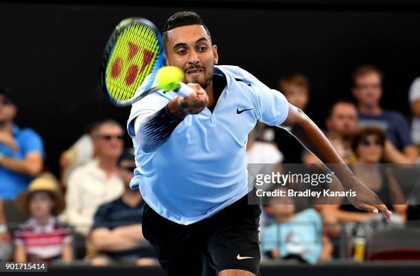 Nick Kyrgios of Australia stretches out to play a forehand in his semi final match against Grigor Dimitrov of Bulgaria during day seven of the 2018...