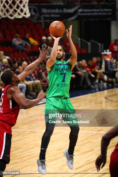 Melo Trimble of the Iowa Wolves shoots a jump shot over Tony Mitchell of the Sioux Falls Skyforce in an NBA G-League game on January 5, 2018 at the...