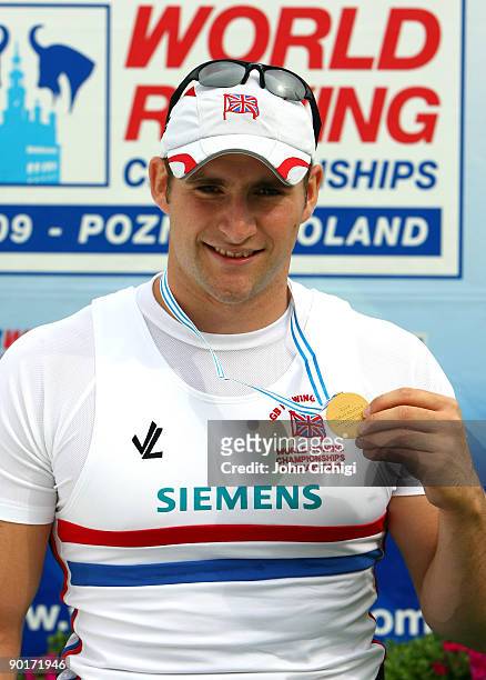 Tom Aggar of Great Britain wins the Arms and Shoulders Men's Single Sculls during the final of the World Rowing Championships on August 29, 2009 in...