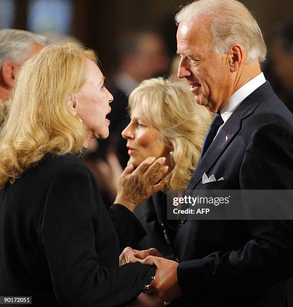 Vice President Joe Biden talks with US Senator Edward Kennedy's ex-wife Joan Kennedy as they await the start of the funeral services for US Senator...