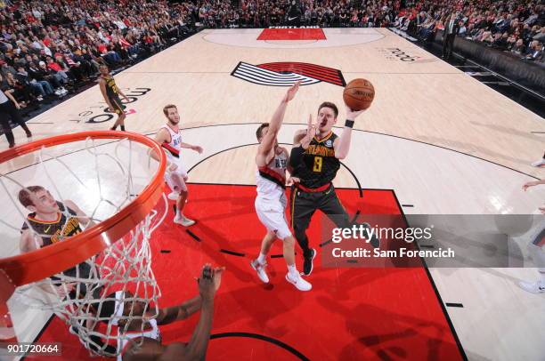Luke Babbitt of the Atlanta Hawks goes to the basket against the Portland Trail Blazers on January 5, 2018 at the Moda Center in Portland, Oregon....
