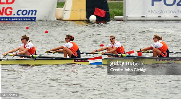 Chantal Achterberg, Nienke Kingma, Carline Bouw and Femke Dekker of Netherlands cross the line to win the Women's Four in the final of the World...