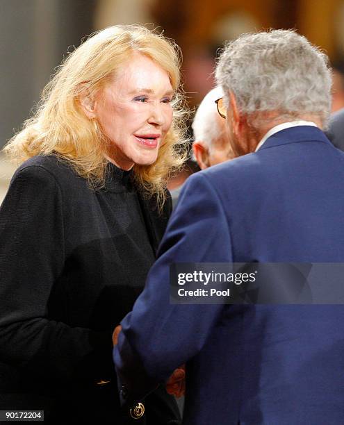 Senator Edward Kennedy's ex-wife Joan Kennedy talks to singer Tony Bennett during funeral services for Sen. Kennedy at the Basilica of Our Lady of...