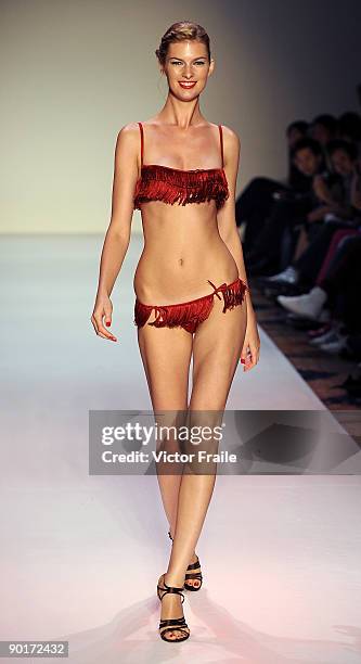 Model showcases designs by La Perla on the catwalk as part of the Red Dress Collection showcase during the Mastercard Luxury Week Hong Kong 2009 at...