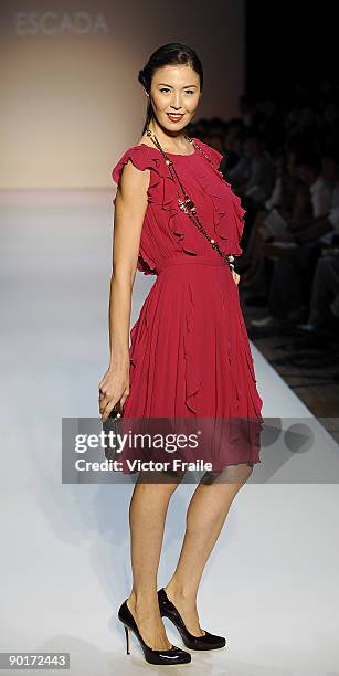 Model showcases designs by Escada on the catwalk as part of the Red Dress Collection showcase during the Mastercard Luxury Week Hong Kong 2009 at The...