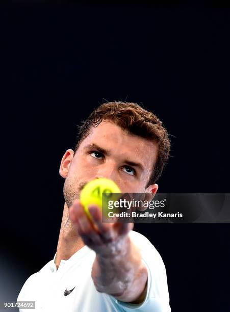 Grigor Dimitrov of Bulgaria serves in his semi final match against Nick Kyrgios of Australia during day seven of the 2018 Brisbane International at...