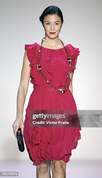 Model showcases designs by Escada on the catwalk as part of the Red Dress Collection showcase during the Mastercard Luxury Week Hong Kong 2009 at The...