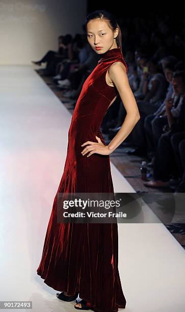 Model showcases designs by Ralpf Lauren on the catwalk as part of the Red Dress Collection showcase during the Mastercard Luxury Week Hong Kong 2009...