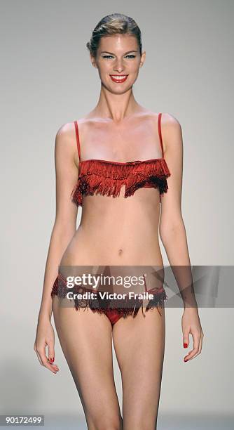 Model showcases designs by La Perla on the catwalk as part of the Red Dress Collection showcase during the Mastercard Luxury Week Hong Kong 2009 at...