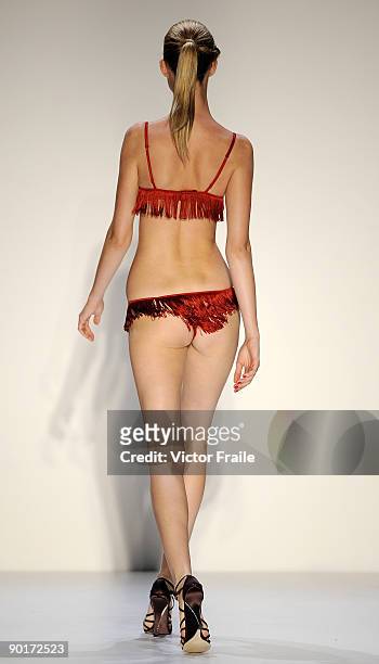 Model showcases designs by La Perla on the catwalk as part of the Red Dress Collection showcase during the Mastercard Luxury Week Hong Kong 2009 at...