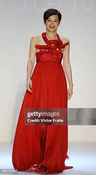 Model showcases designs by Vivienne Tam on the catwalk as part of the Red Dress Collection showcase during the Mastercard Luxury Week Hong Kong 2009...