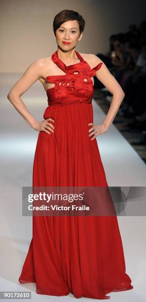 Model showcases designs by Vivienne Tam on the catwalk as part of the Red Dress Collection showcase during the Mastercard Luxury Week Hong Kong 2009...