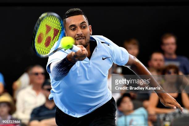 Nick Kyrgios of Australia stretches out to play a forehand in his semi final match against Grigor Dimitrov of Bulgaria during day seven of the 2018...