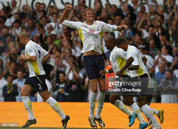 Peter Crouch of Tottenham Hotspur celebrates his goal during the Barclays Premier League match between Totenham Hotspur and Birmingham City at White...