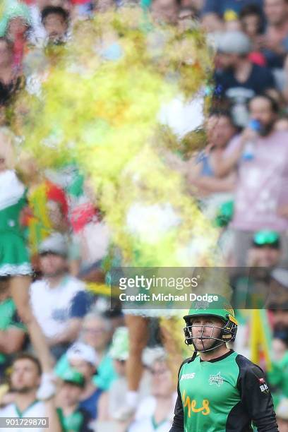 Ben Dunk of the Stars walks out to bat during the Big Bash League match between the Melbourne Stars and the Melbourne Renegades at Melbourne Cricket...