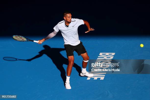 Nick Kyrgios of Australia plays a forehand in his semi final match against Grigor Dimitrov of Bulgaria during day seven of the 2018 Brisbane...