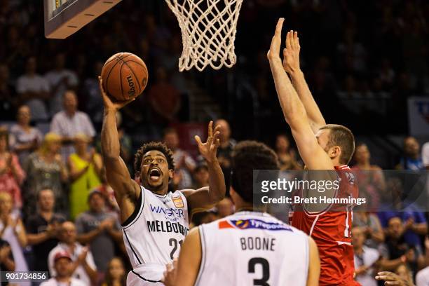 Casper Ware of Melbourne lays up a shot under pressure during the round 13 NBL match between the Illawarra Hawks and Melbourne United at Wollongong...