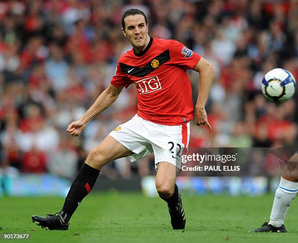 Manchester United's Irish defender John O'Shea in action during the English Premier League football match between Manchester United and Arsenal at...