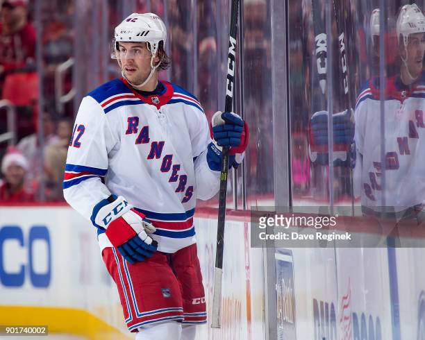 Brendan Smith of the New York Rangers ""skates to the penalty box during an NHL game against the Detroit Red Wings at Little Caesars Arena on...