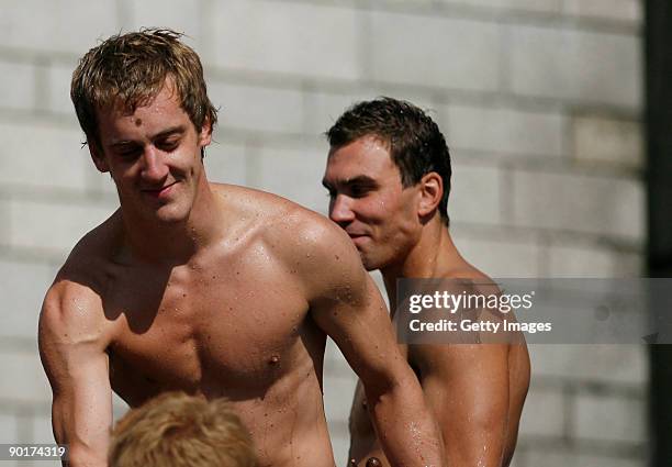 Gary Hunt of Great Britain celebrates winning the competition with Michal Navratil of Czech Republic after the Red Bull Cliff Diving World Series at...