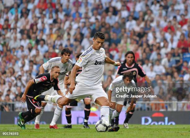 Cristiano Ronaldo of Real Madrid shoots to score from the penalty spot during the La Liga match between Real Madrid and Deportivo La Coruna at the...