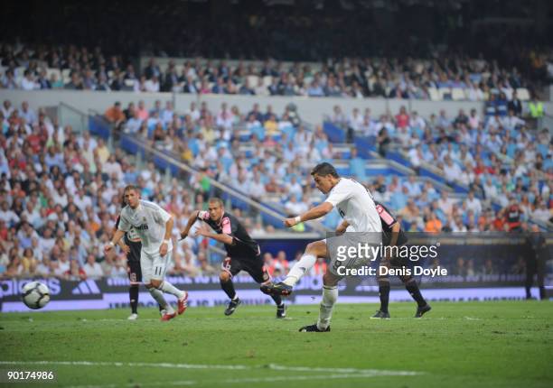 Ronaldo of Real Madrid scores a penalty goal during the La Liga match between Real Madrid and Deportivo La Coruna at the Santiago Bernabeu stadium on...