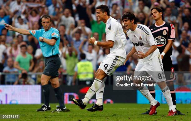 Cristiano Ronaldo of Real Madrid celebrates his goal with Kaka during La Liga match between Real Madrid and Deportivo La Coruna at Estadio Santiago...