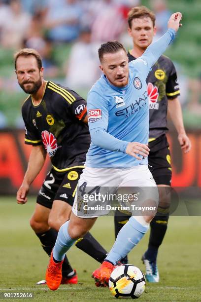 Ross McCormack of Melbourne City takes on the defence during the round 14 A-League match between Melbourne City and the Wellington Phoenix at AAMI...