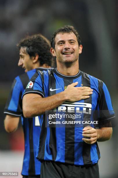 Inter Milan's Serbian midfielder Dejan Stankovic celebrates after scoring during their Serie A football match AC Milan vs Inter Milan at San Siro...
