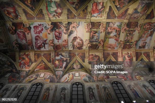 Ceiling painting art seen at the chapel. The Replica of the Sistine Chapel, An replica exact and actual size of the building located on the right...