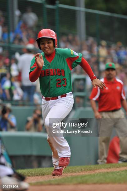 Centerfielder Raymundo Berrones of Mexico comes home for a run against Asia Pacific in the International final at Lamade Stadium on August 29, 2009...