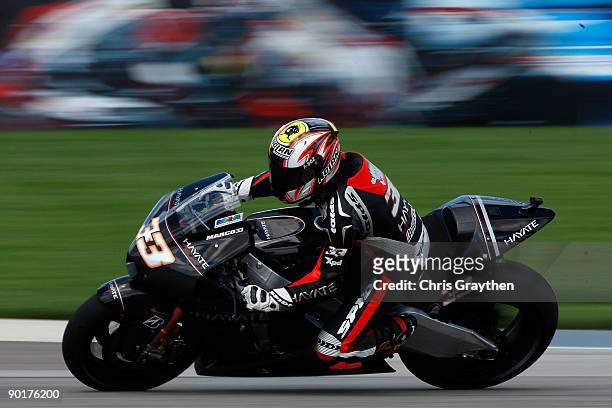 Marco Melandri of Italy, rides the Hayate Racing Team Kawasaki during qualifying for the MotoGP Red Bull Indianapolis Grand Prix at the Indianapolis...