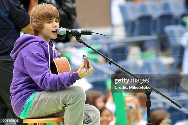 Singer Justin Bieber performs during Arthur Ashe Kid's Day at the 2009 U.S. Open at the Billie Jean King National Tennis Center on August 29, 2009 in...